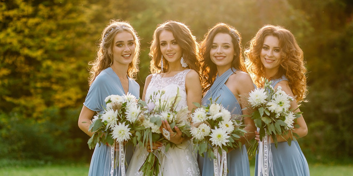 bridal party in dusty blue