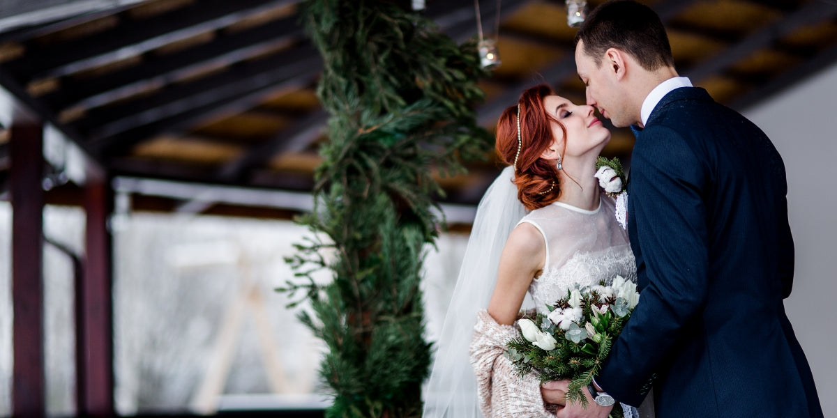 winter rustic wedding ceremony with candles