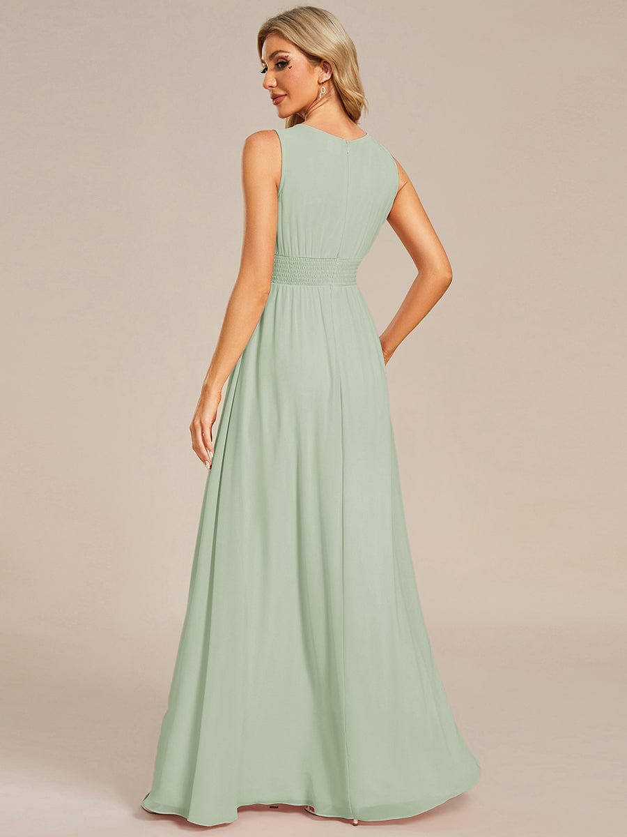 A-Line Chiffon Bridesmaid Dress with Sleeveless Round Neckline and Pleats #color_Mint Green