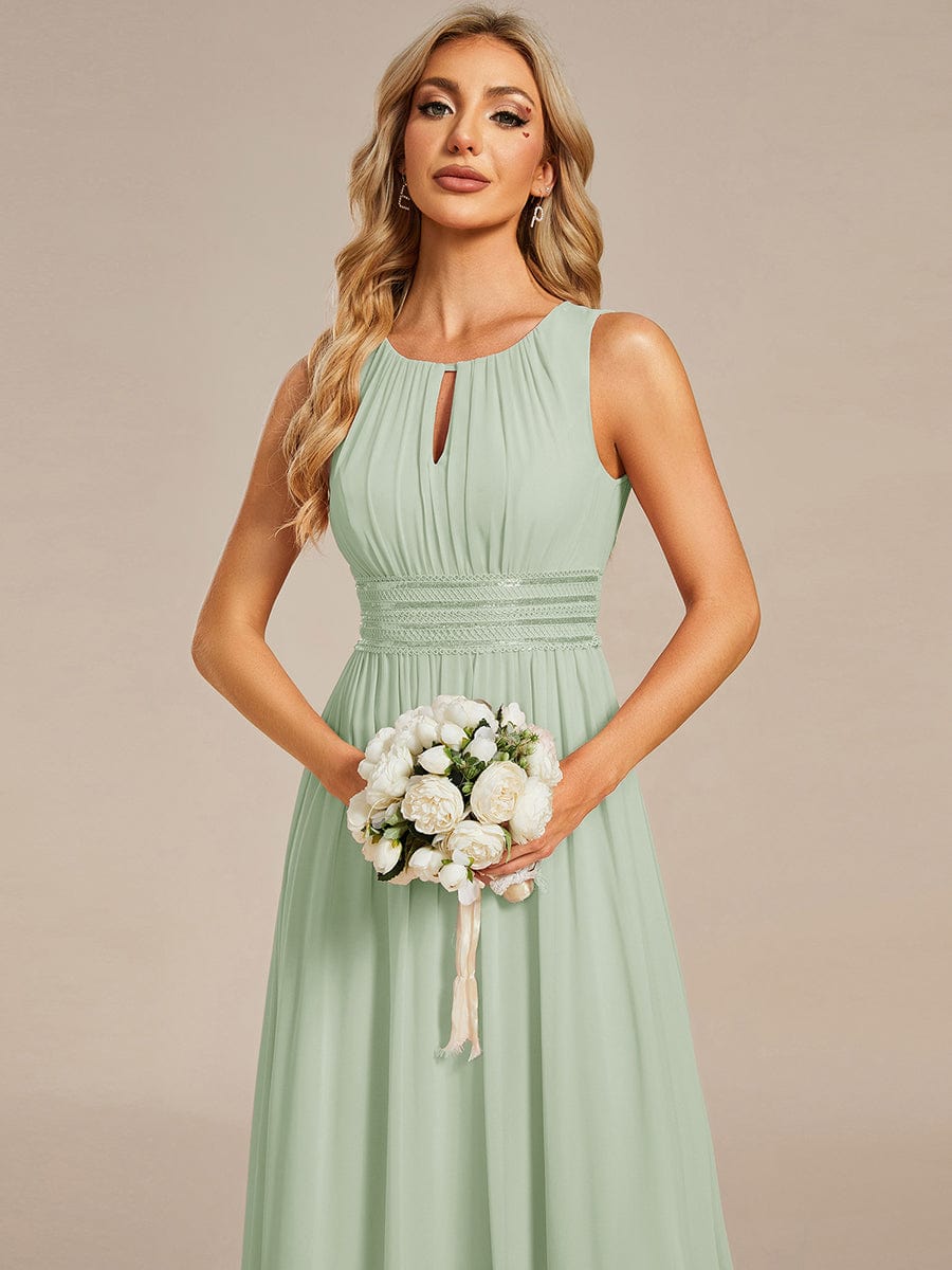 A-Line Chiffon Bridesmaid Dress with Sleeveless Round Neckline and Pleats #color_Mint Green