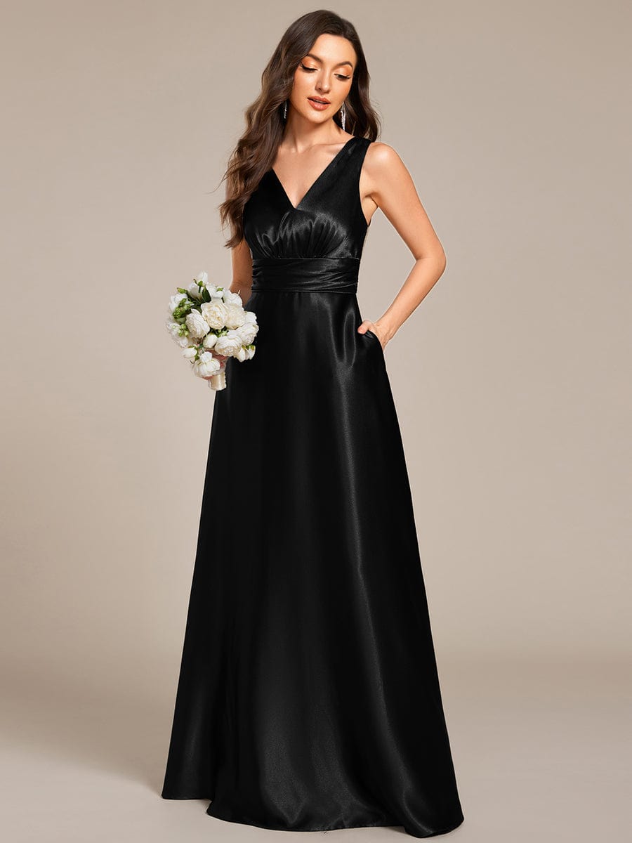 Sleeveless Empire Waist Satin Maxi Dress With Pockets in Black #color_Black