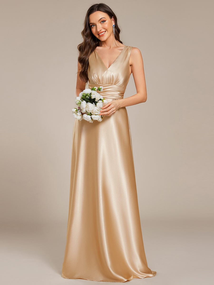 Sleeveless Empire Waist Satin Maxi Bridesmaid Dress With Pockets #color_Champagne