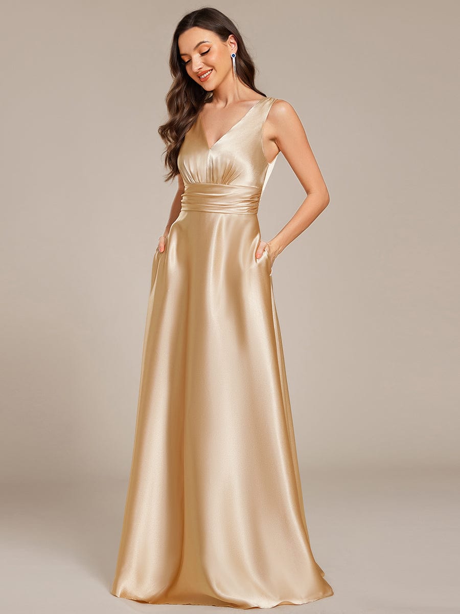 Sleeveless Empire Waist Satin Maxi Bridesmaid Dress With Pockets #color_Champagne